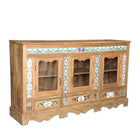 Side angle image of an antique Portuguese style South Indian glass display case made from reclaimed teak wood with ceramic inlays – sustainable teak wood furniture with historical and cultural elegance.