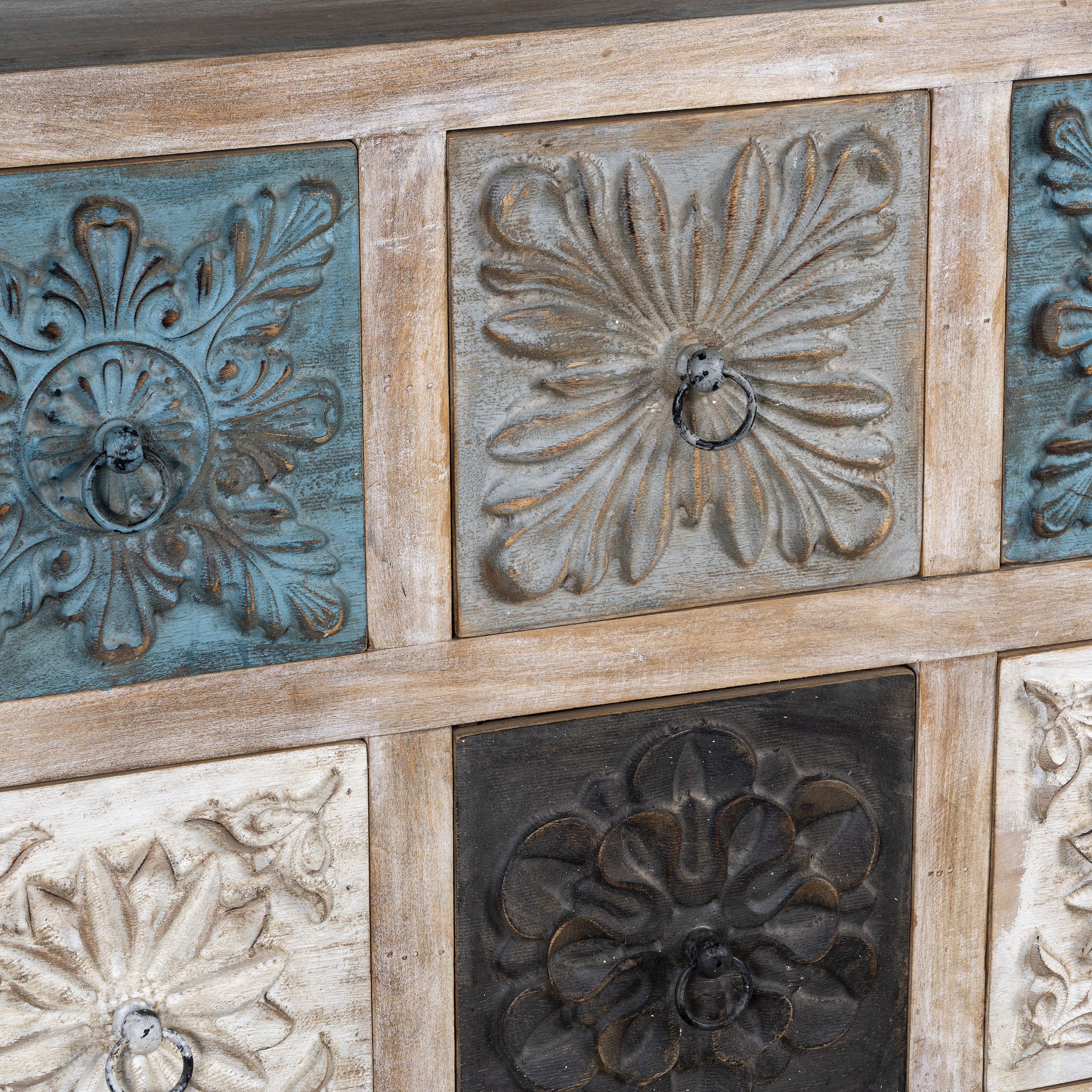 Decorative wooden panel with embossed floral designs in various colors.
