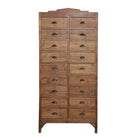 White background image of a tall teak wood furniture chest of drawers with 18 drawers and iron handles, in natural teak finish, 88 × 190 × 40 cm