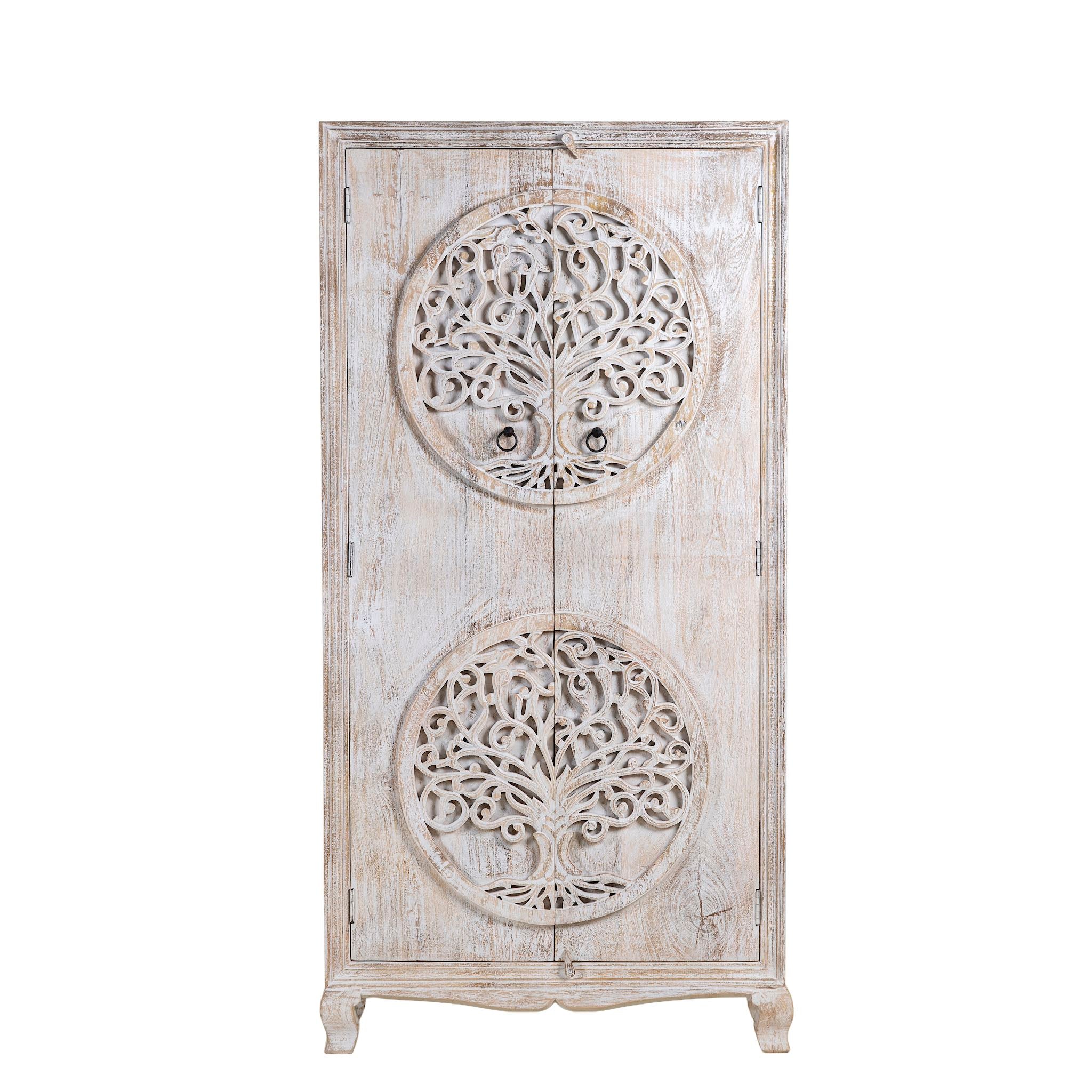 White background image of a whitewashed mango wood wardrobe featuring intricate hand-carved double tree of life design on the doors.