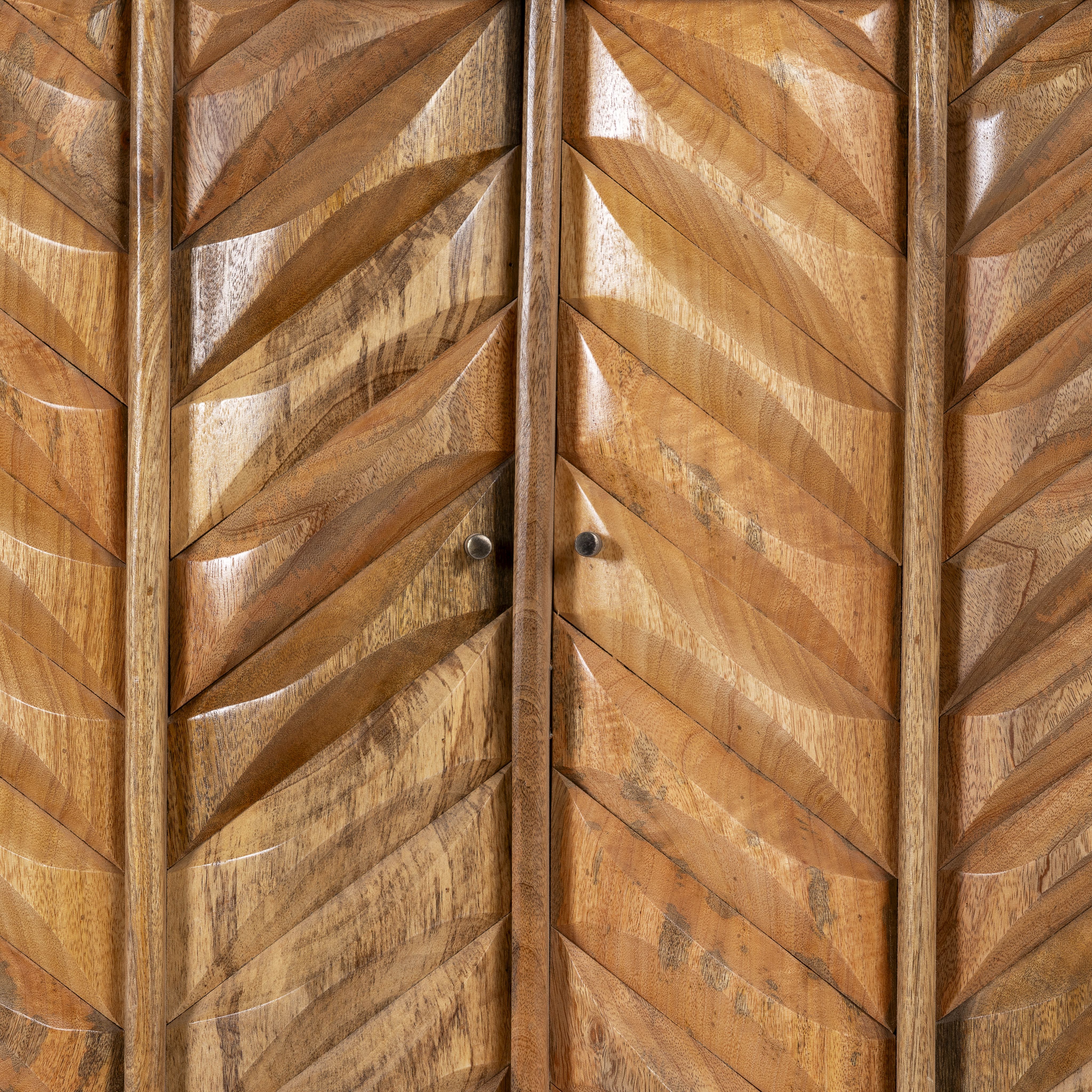 Close up image of a handcrafted mango wood cabinet with raised chevron design and brass handles – Jayapal by Om Home & Garden