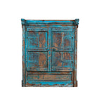 White background image of an antique teak window mirror with blue paint and shutters, vintage wall panel design from our vintage home accessories range.