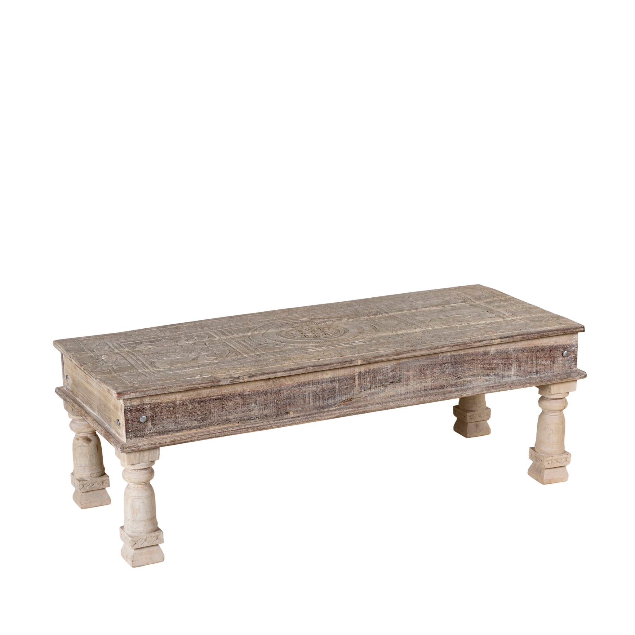 White background image of a  teak wood coffee table with antique carved door top, also ideal as an entryway table vintage statement piece.