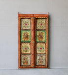 Hand-painted old Indian teak door panel with floral motifs in vintage style.