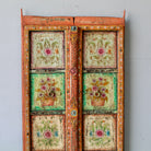 Hand-painted old Indian teak door panel with floral motifs in vintage style.