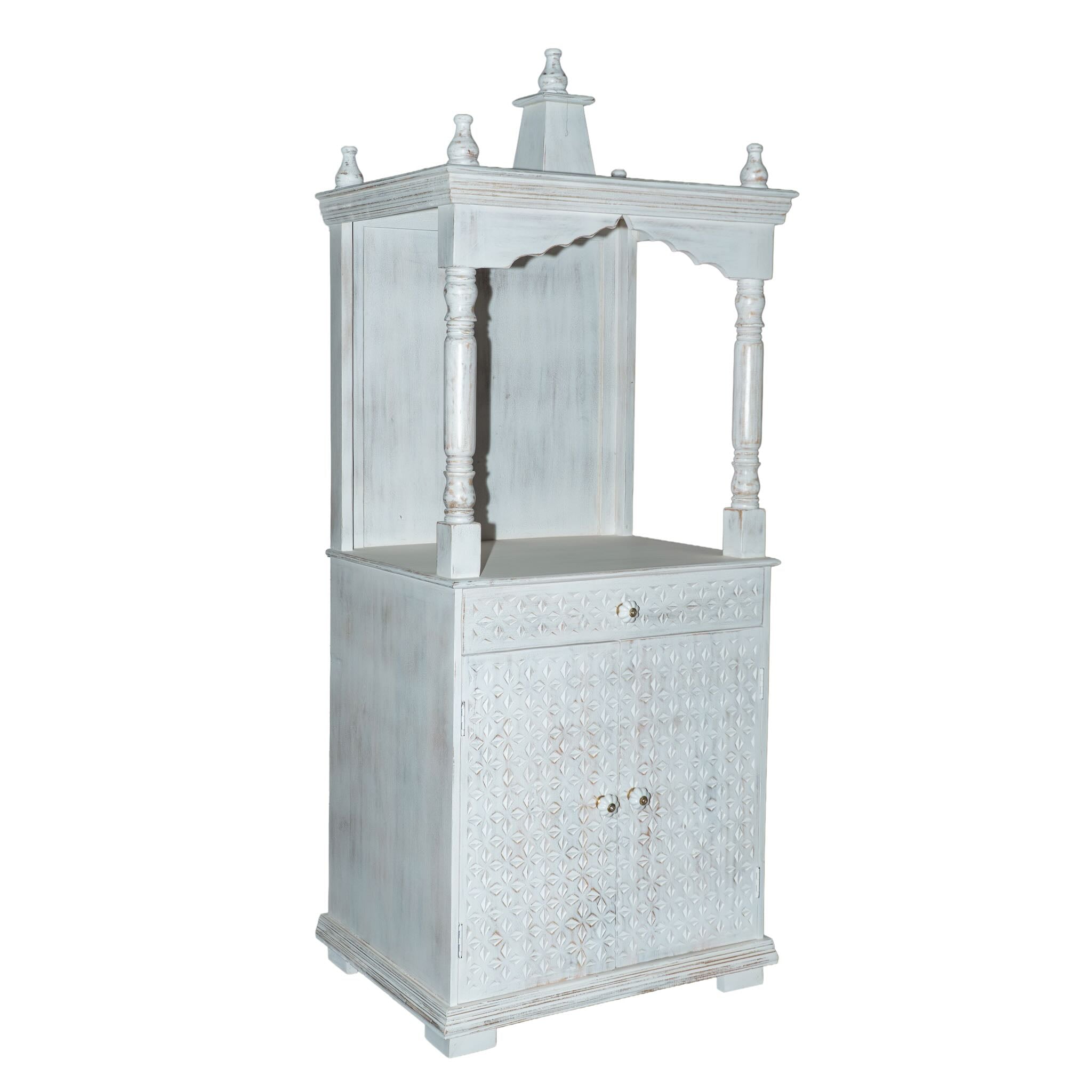 Side angle image of a Shivani mango wood house temple in whitewashed finish with carved floral doors and traditional arched canopy—an elegant example of hand-carved Mandirs and Indian home temples.