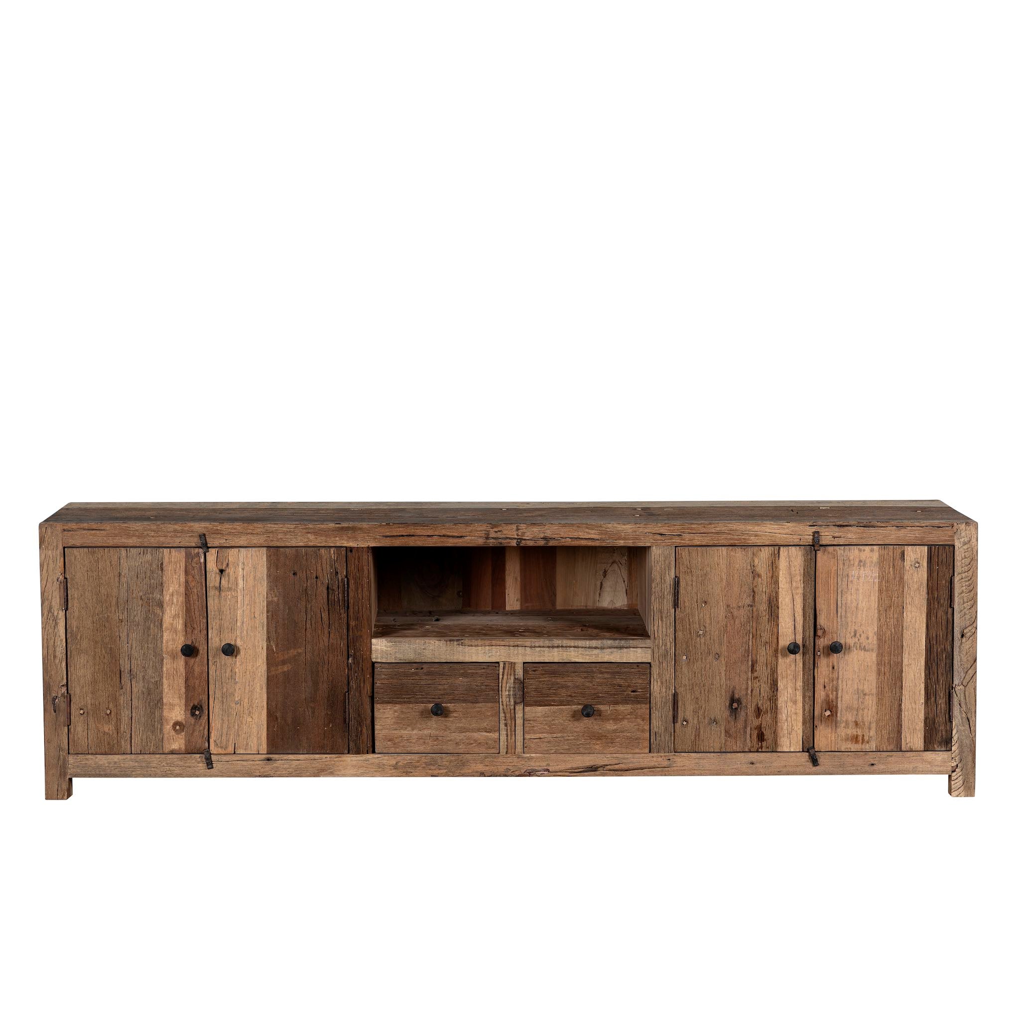 White background image of a large sideboard in Driftwood/ Wabi Sabi style made from recycled old wood, featuring four cabinet doors, two central drawers, and an open shelf with a naturally aged, rustic finish.

