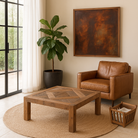 Lifestyle imagination of a rustic minimalistic coffee table with geometric inlay, reclaimed wood coffee table crafted from sustainable furniture materials, 100 × 100 × 45 cm.