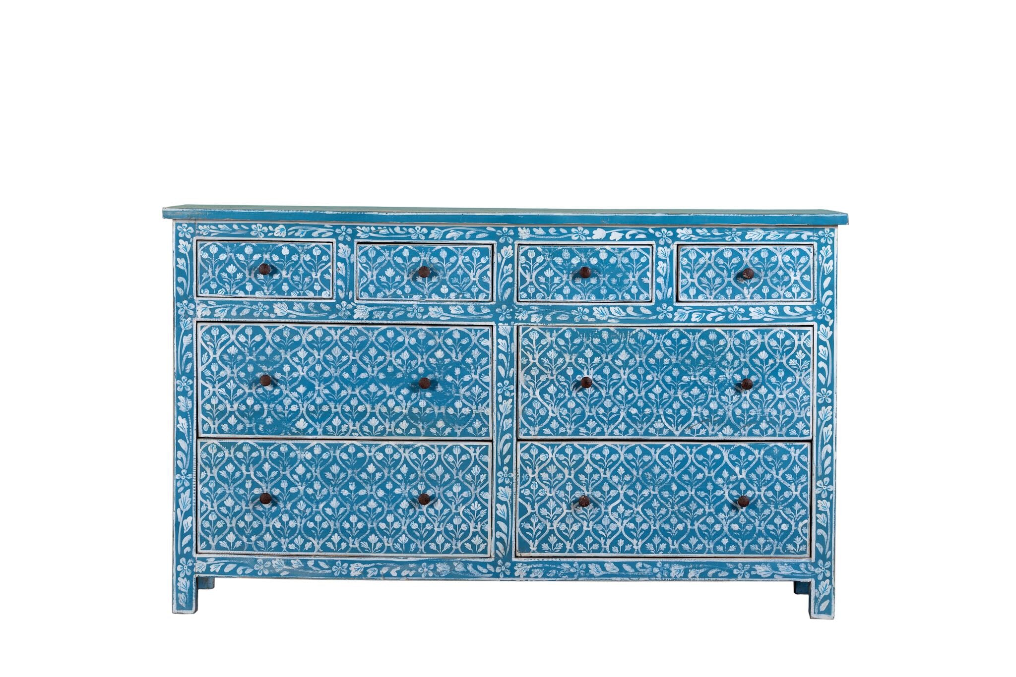 White background image of a hand-painted chest of drawers made of reclaimed wood in blue and white – Nitara model by Om Home & Garden