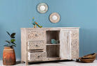Open door and drawer image of a hand-carved wood carved sideboard in mango wood furniture style with vintage three-layer finish.