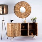 Side angle image with open doors of a handmade mango wood sideboard with live-edge design, brass-coated base, and handles—an artisanal furniture piece combining natural and modern elements.