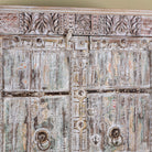 Close up image of a reclaimed wood wardrobe made with antique door panels – a handcrafted piece of old door furniture perfect for Indian home decor and rustic interiors.