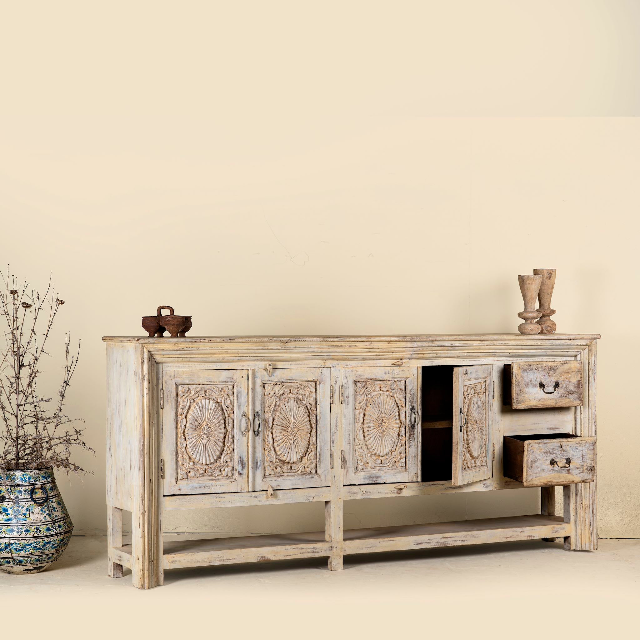 Open drawer image of a antique console table wood with carved teak front, part of our teakwood tables collection.