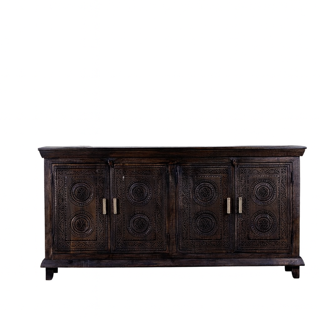 White background image of a handcrafted wood carved sideboard in black mango wood with four doors, versatile for bedroom furniture or living spaces, 180 × 40 × 90 cm.
