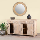 Open door image of a hand-carved mango wood sideboard with sandblasted finish – a rustic mango wood furniture piece ideal for Ibiza style interiors.
