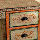 Close up image of a hand-painted desk made of reclaimed wood with floral detailing – Tejasvini model by Om Home & Garden