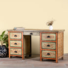 Side angle image of a hand-painted desk made of reclaimed wood with floral detailing – Tejasvini model by Om Home & Garden