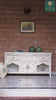 Life style video of a hand-carved console table in mango wood with whitewashed finish, perfect for a bohemian interior.