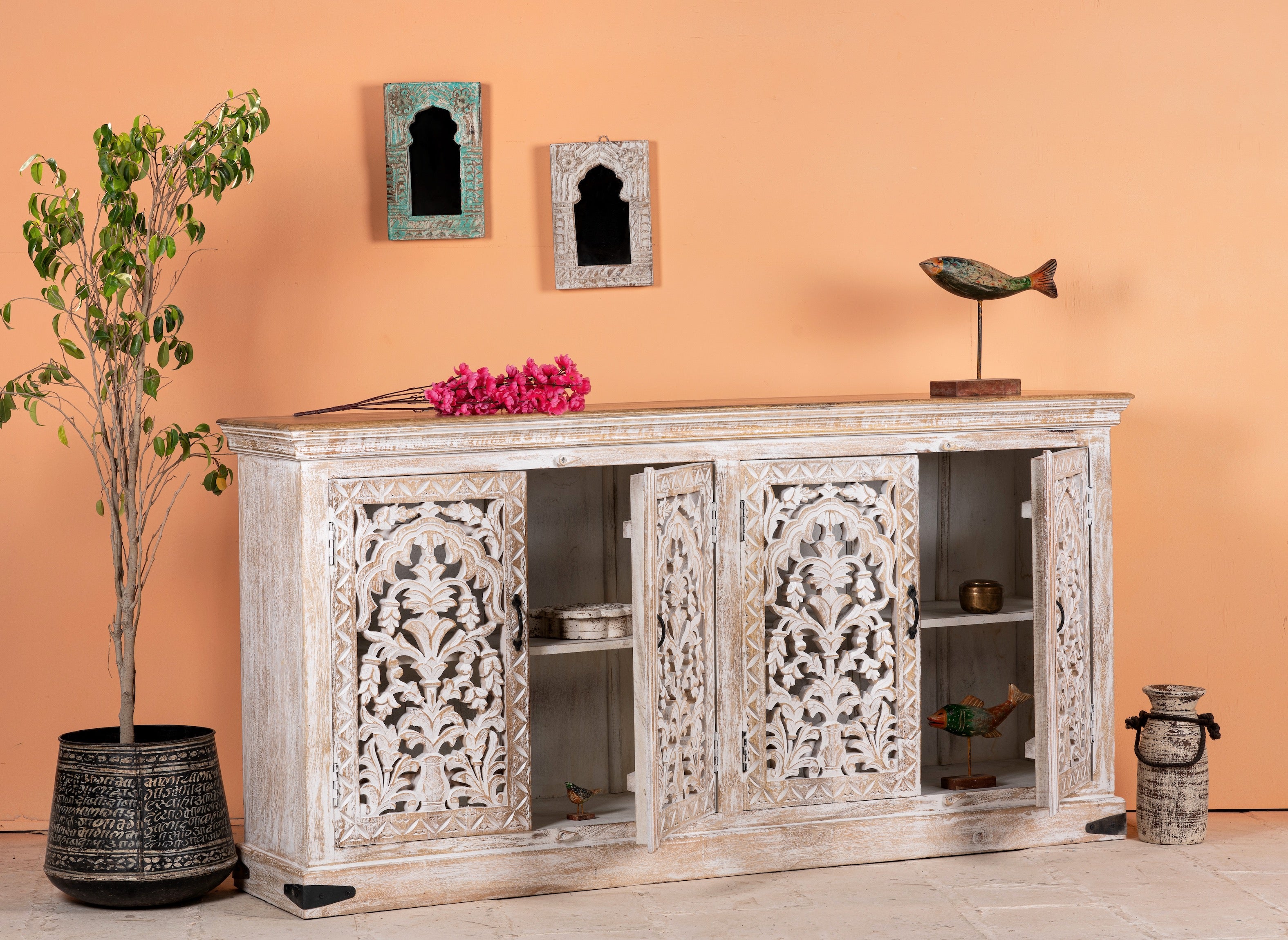 Open door image of a Hand carved mango wood sideboard with whitewashed finish and intricate Indian patterns; ideal for bedroom furniture or as a hand carved sideboard, 180 × 90 × 40 cm.