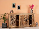 Open door image of a hand carved mango wood sideboard Bagodara with whitewashed finish and intricate Indian patterns; ideal for bedroom furniture or as a hand carved sideboard, 180 × 90 × 40 cm.