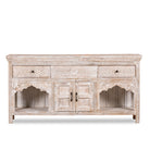 White background image of a hand-carved console table in mango wood with whitewashed finish, perfect for a bohemian interior.