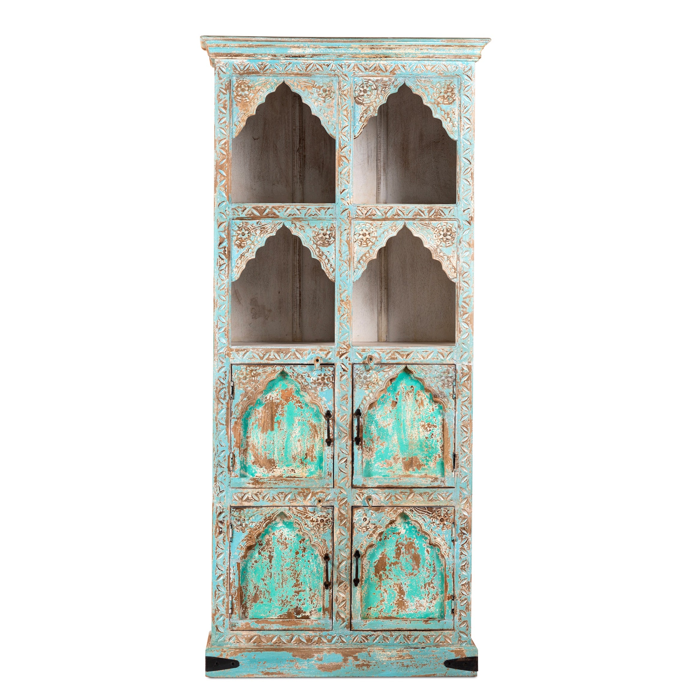 White background image of a hand-carved mango wood shelf with arched open display and lower cabinets – vintage home decoration piece in distressed pastel blue finish with Indian architectural detailing.