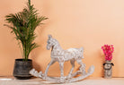 Hand-carved whitewashed mango wood rocking horse – artistic Indian home accessory and mango wood décor, ideal for entryways or living rooms, 105x80x30cm.