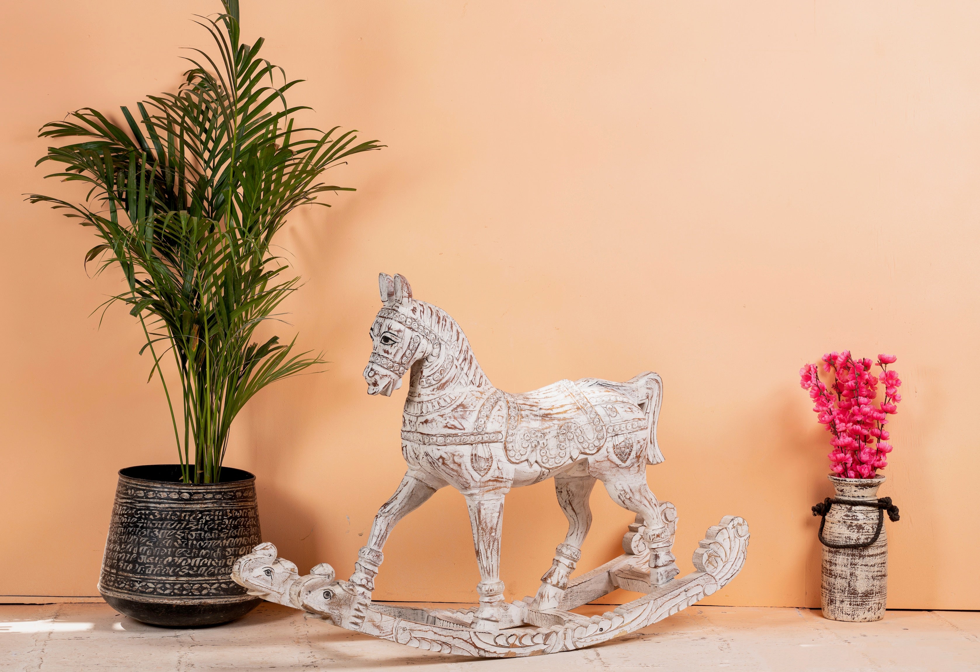 Hand-carved whitewashed mango wood rocking horse – artistic Indian home accessory and mango wood décor, ideal for entryways or living rooms, 105x80x30cm.
