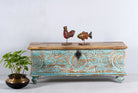 Hand-carved mango wood chest in blue with natural wood top – carved wooden furniture and wooden storage chest for eclectic or boho interiors.