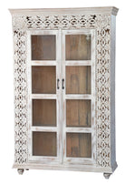 White background image of a handcrafted mango wood cabinet with glass-panelled doors and internal storage – carved wood furniture made from sustainable mango wood with unique natural grain.