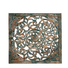 White background image of a Nadya carved wooden wall panel made from mango wood with intricate floral carving—an elegant wooden wall decoration with natural texture and artisan detail.