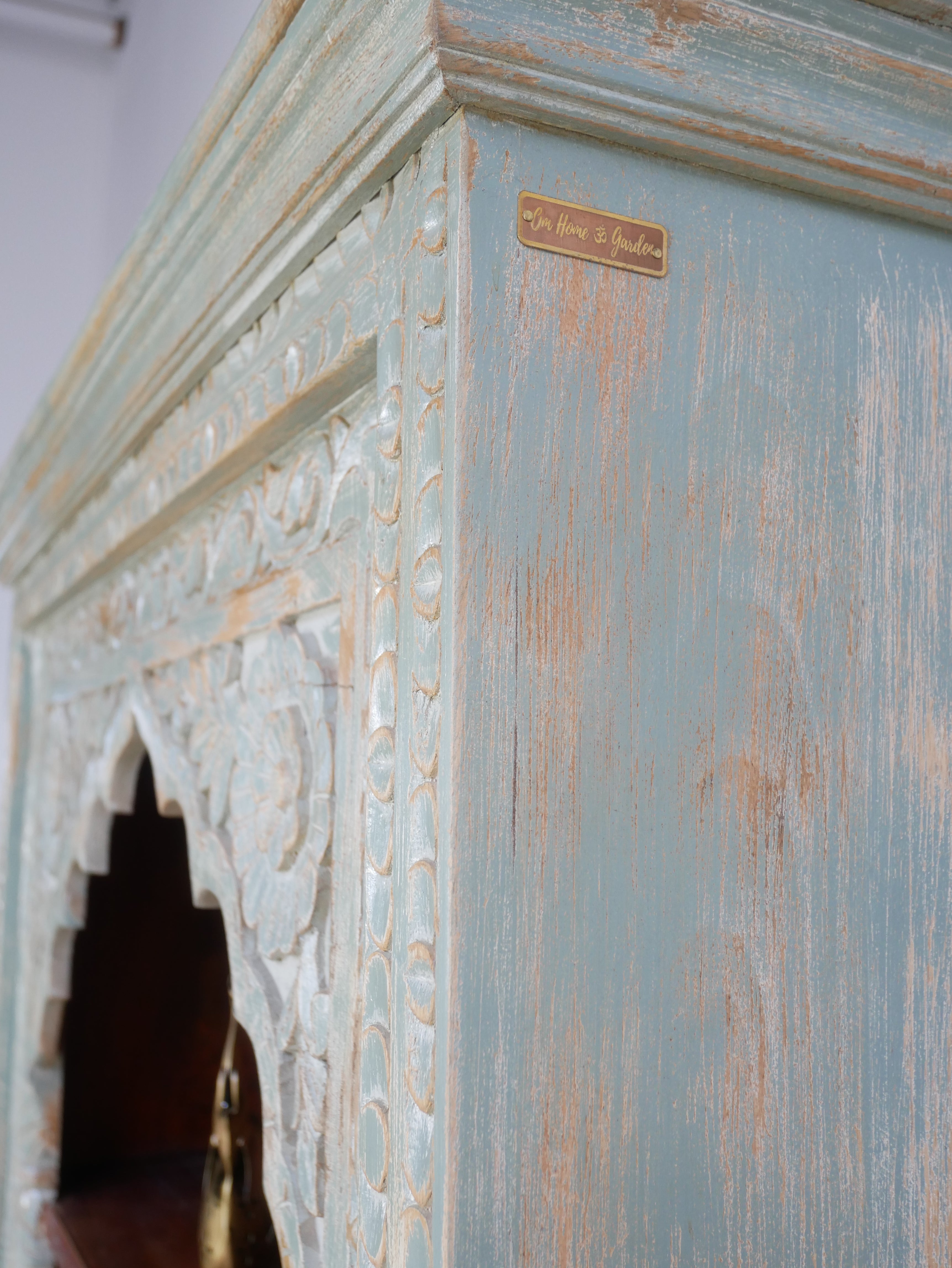 Etawah, indian-style green cabinet