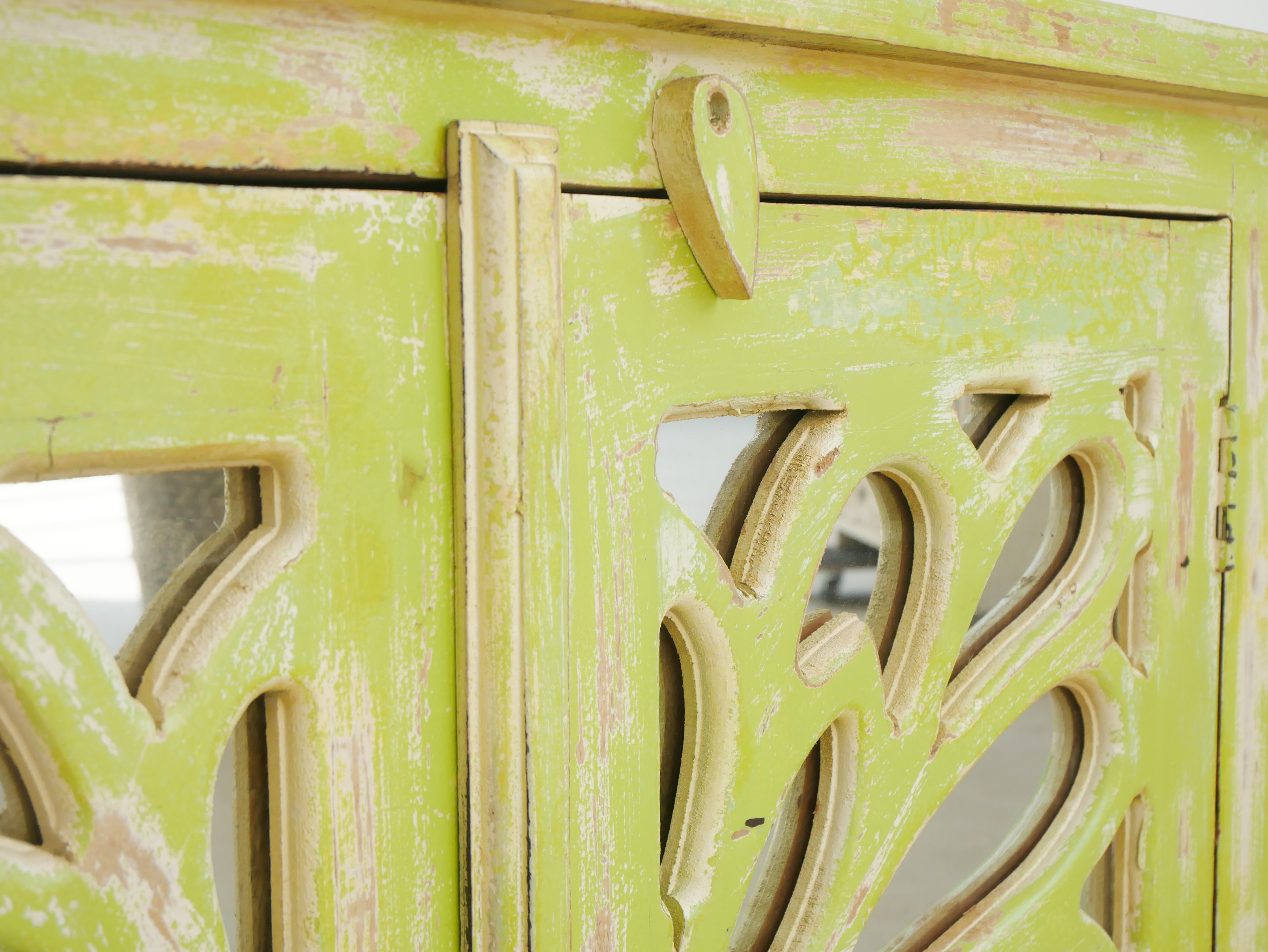 Freen star, antique sideboard with glass doors