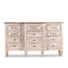 White background image of a hand-carved mango wood sideboard with lotus-inspired drawer motifs and whitewashed finish; a wood carved sideboard and unique furniture piece, 160 × 92 × 45 cm.